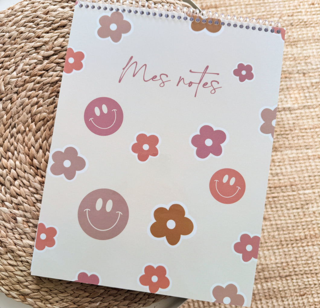 Cahier de notes (sourires et fleurs)