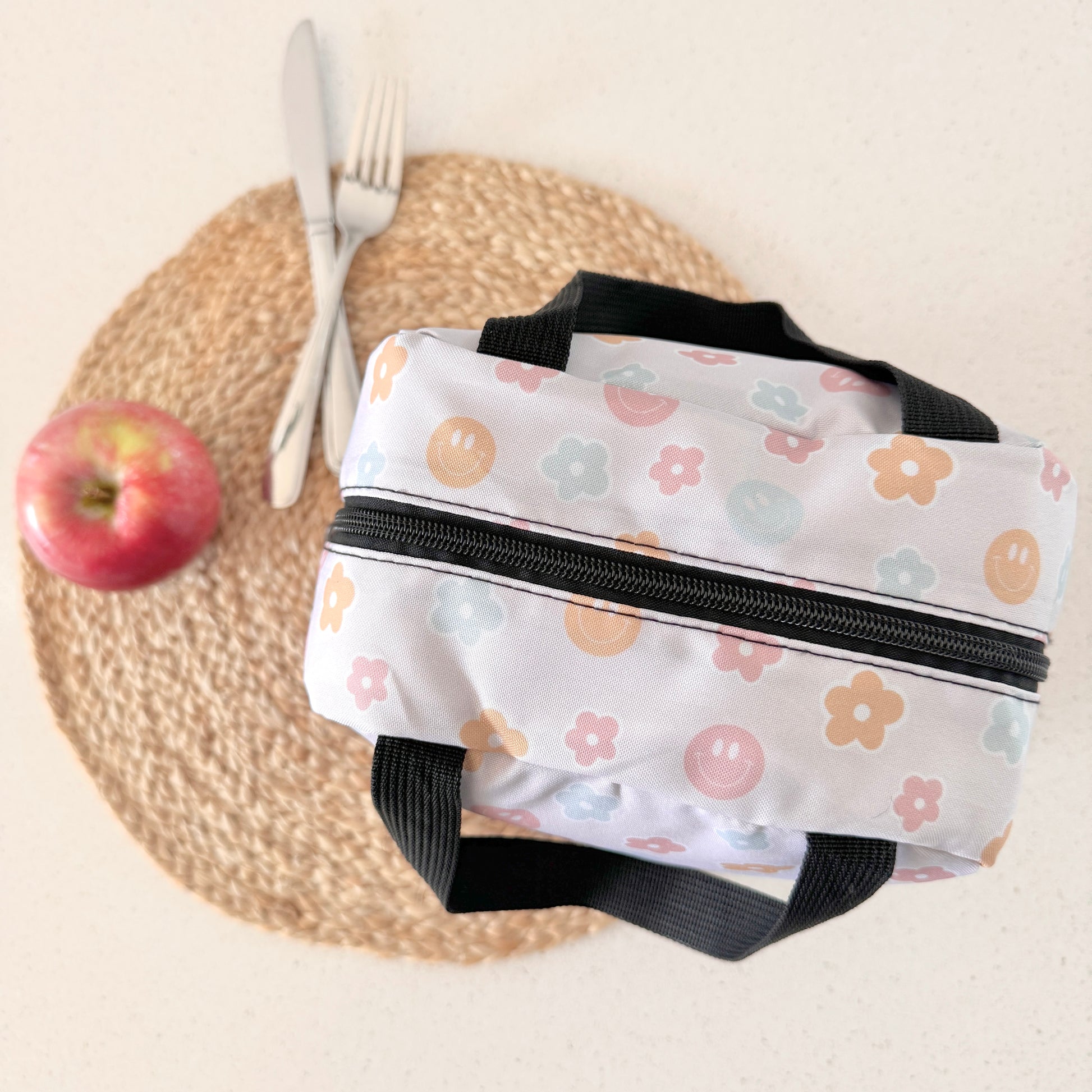 Boîte à lunch (sourires et fleurs pastels)